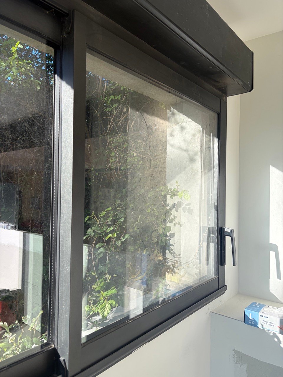 Porte coulissante vitrée avant nettoyage